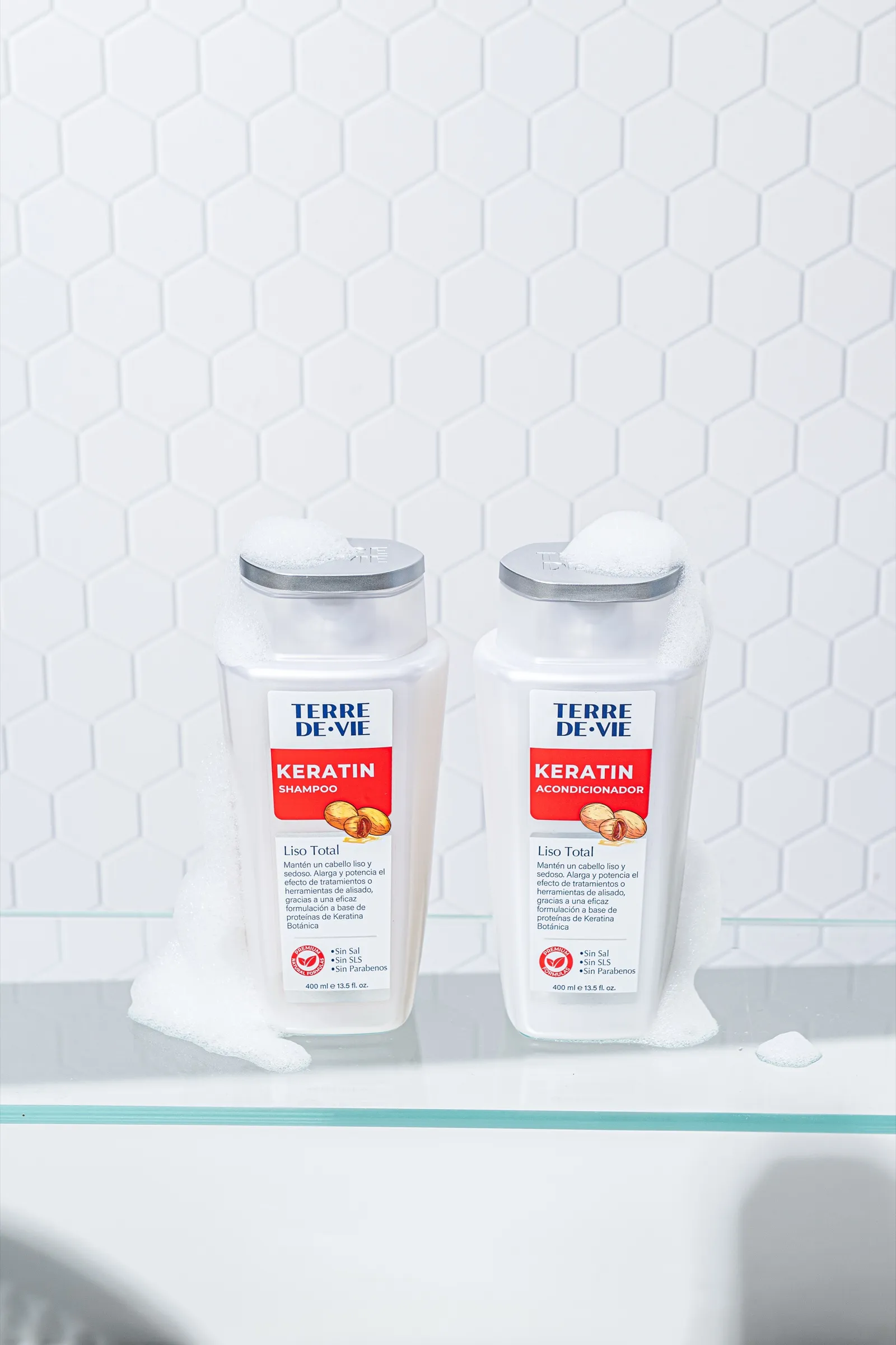 Two bottles of Terre de Vie keratin shampoo